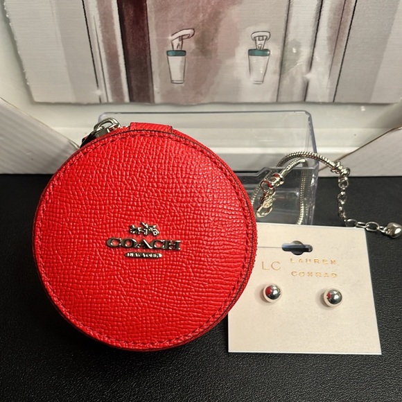 Coach Handbags - COACH Red Leather JEWELRY ZIP AROUND case silver hardware NWOT w/free earrings.